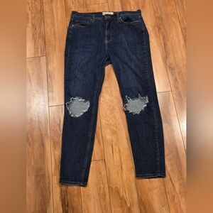 Free People mid-rise Dark Wash busted knee skinny jeans